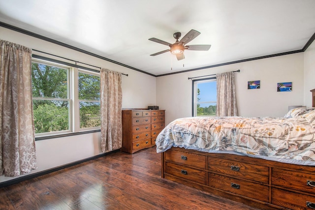 2278 W Wagner Rd, Buchanan, MI 49107 - bedroom with hardwood / wood-style floors, multiple windows, ornamental molding, baseboards, and a ceiling fan