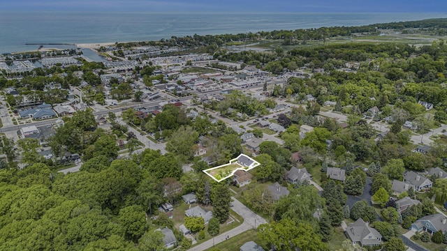 121 S Barker St, New Buffalo, MI 49117 - aerial view of property's location with a nearby body of water and property parcel outlined