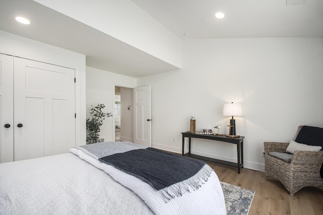 121 S Barker St, New Buffalo, MI 49117 - bedroom with light wood finished floors, recessed lighting, baseboards, and a closet