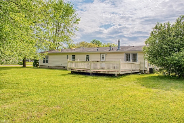 3490 Luce Rd, Flushing, MI 48433 - back of property with a yard, a wooden deck, crawl space, and central air condition unit