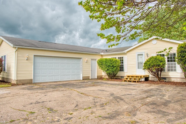 3490 Luce Rd, Flushing, MI 48433 - ranch-style home featuring driveway, an attached garage, and crawl space
