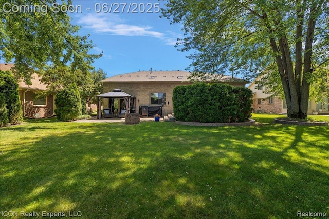 18529 Sumpter Forest Dr, Macomb, MI 48042 - back of property with a gazebo, a yard, and a patio