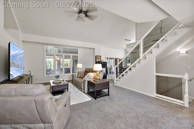18529 Sumpter Forest Dr, Macomb, MI 48042 - living room featuring a ceiling fan, high vaulted ceiling, and stairway