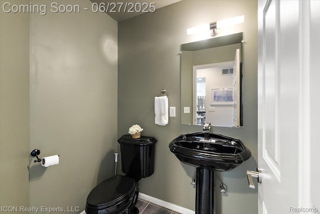 18529 Sumpter Forest Dr, Macomb, MI 48042 - half bathroom featuring toilet and tile patterned floors
