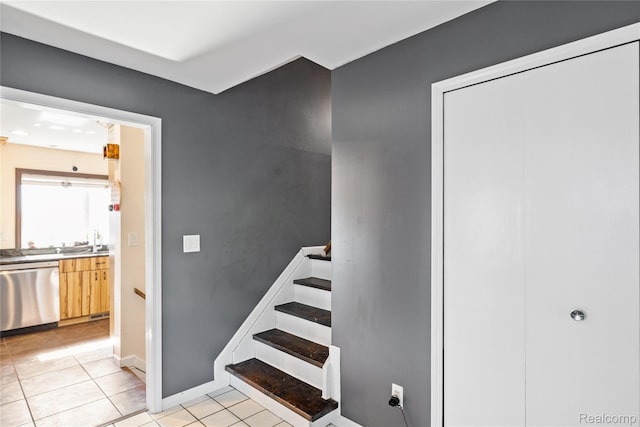 254 Cross Timbers St, Oxford, MI 48371 - stairway featuring tile patterned floors and baseboards