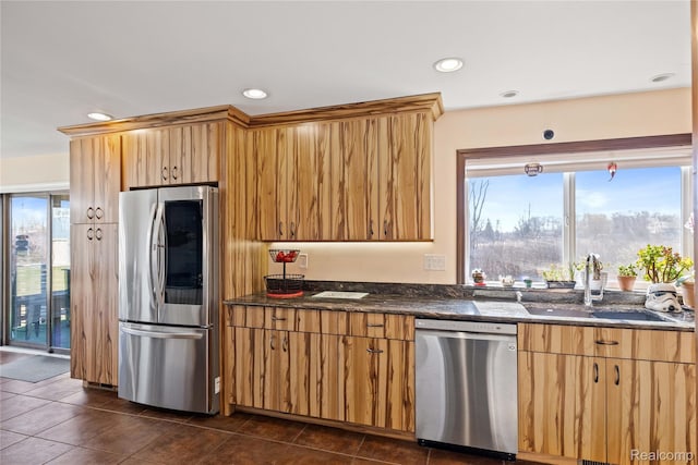 254 Cross Timbers St, Oxford, MI 48371 - kitchen with appliances with stainless steel finishes, healthy amount of natural light, dark stone counters, and recessed lighting