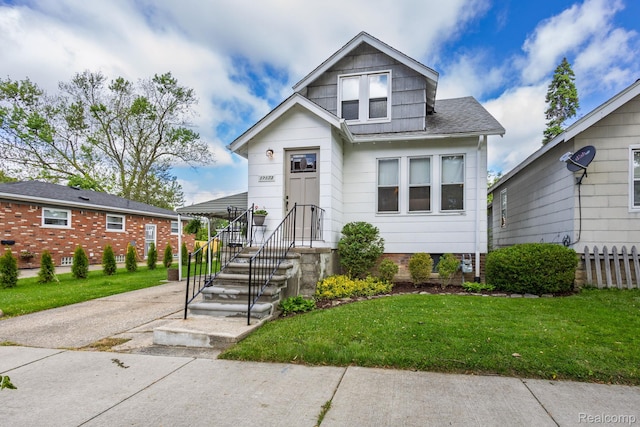 17173 New York St, Detroit, MI 48224 - view of front of home featuring roof with shingles