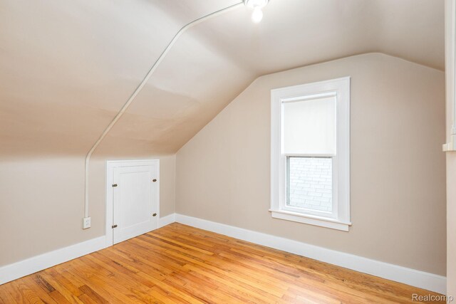 17173 New York St, Detroit, MI 48224 - additional living space featuring vaulted ceiling, wood finished floors, and baseboards
