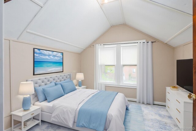17173 New York St, Detroit, MI 48224 - bedroom featuring vaulted ceiling, light colored carpet, and baseboards