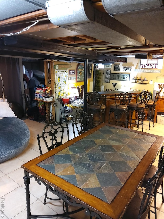 24934 Wilson Ave S, Dearborn, MI 48128 - dining area featuring a dry bar and tile patterned floors