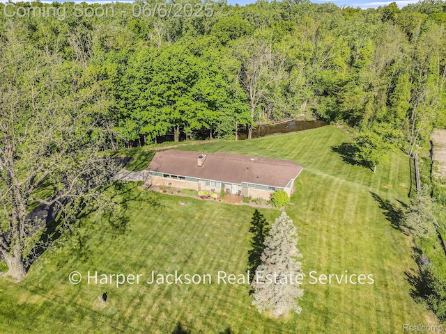2210 Brookhaven Dr, Flint, MI 48507 - view from above of property with a heavily wooded area