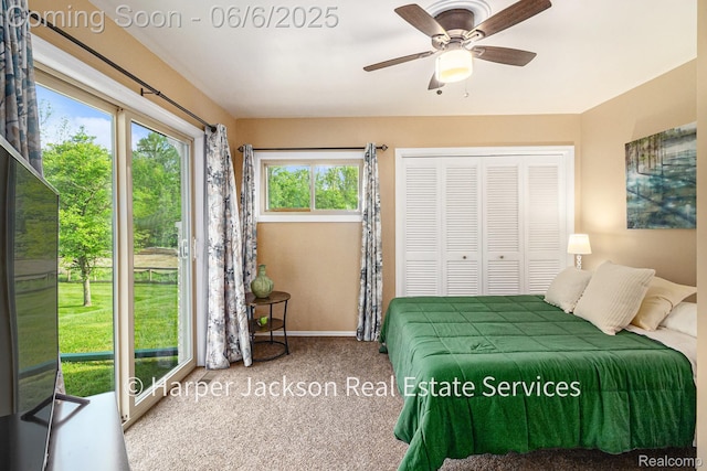 2210 Brookhaven Dr, Flint, MI 48507 - bedroom featuring carpet, baseboards, a closet, and ceiling fan