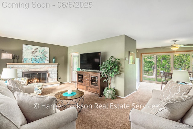 2210 Brookhaven Dr, Flint, MI 48507 - living room with carpet flooring, baseboards, ceiling fan, and a fireplace