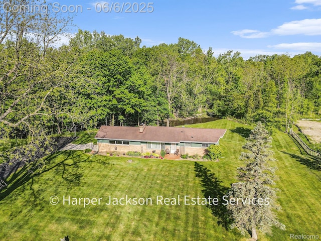2210 Brookhaven Dr, Flint, MI 48507 - aerial view of property and surrounding area featuring a forest