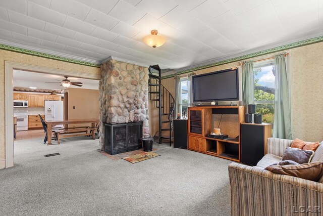 4460 Munger Rd, Tipton, MI 49287 - living area featuring wallpapered walls, carpet flooring, ornamental molding, and ceiling fan