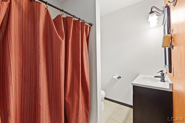 4460 Munger Rd, Tipton, MI 49287 - bathroom with vanity, toilet, baseboards, and a shower with curtain