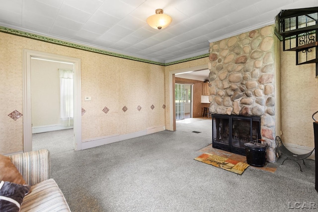 4460 Munger Rd, Tipton, MI 49287 - unfurnished living room with crown molding, a stone fireplace, and wallpapered walls