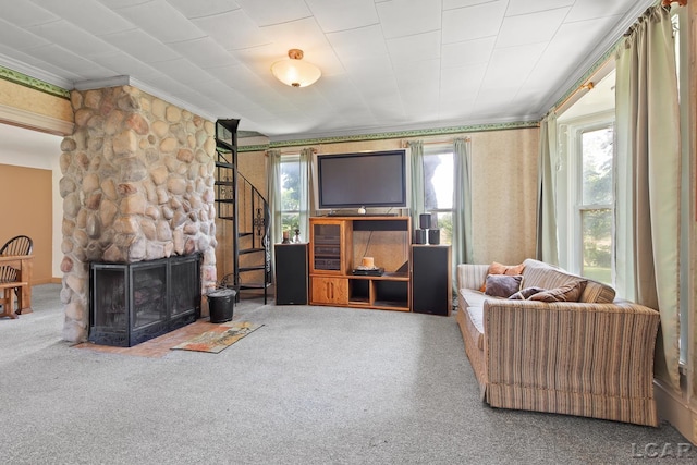 4460 Munger Rd, Tipton, MI 49287 - living room featuring ornamental molding, carpet flooring, and a fireplace