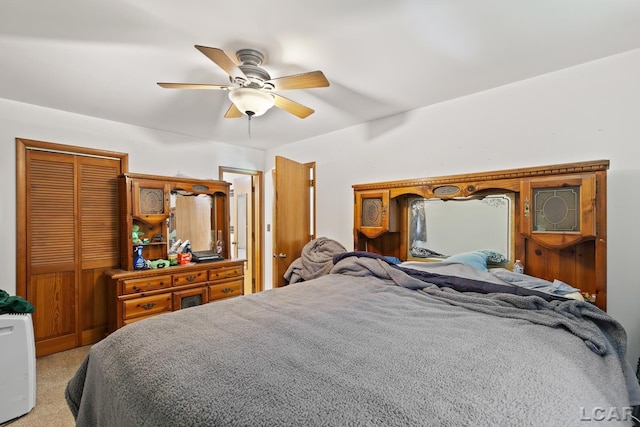 4460 Munger Rd, Tipton, MI 49287 - bedroom featuring a closet, light colored carpet, and a ceiling fan