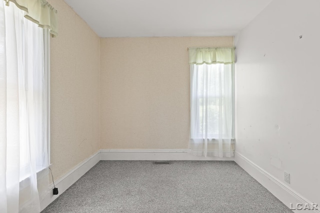 4460 Munger Rd, Tipton, MI 49287 - carpeted empty room featuring baseboards