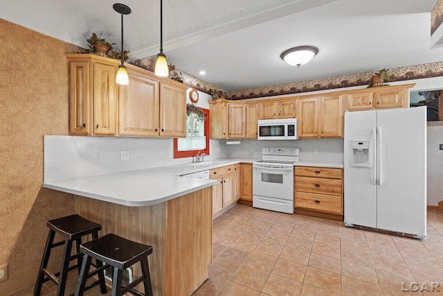 4460 Munger Rd, Tipton, MI 49287 - kitchen featuring white appliances, a sink, light brown cabinets, and a peninsula