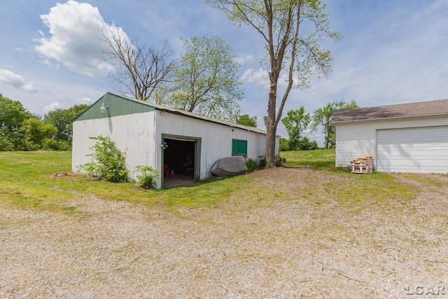 4460 Munger Rd, Tipton, MI 49287 - view of pole building with a lawn