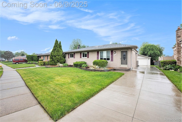 16362 Glenfield Dr, Macomb, MI 48044 - ranch-style house featuring brick siding, a garage, a front lawn, an outbuilding, and a chimney