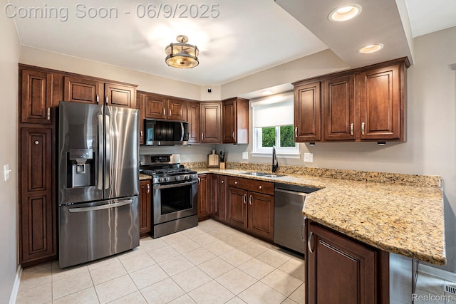 16362 Glenfield Dr, Macomb, MI 48044 - kitchen with stainless steel appliances, a sink, light tile patterned flooring, light stone countertops, and recessed lighting