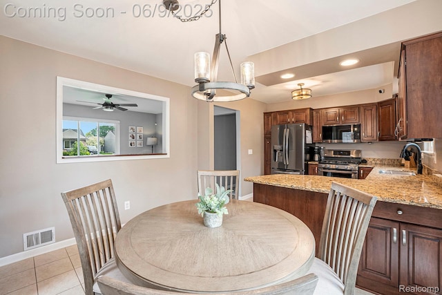 16362 Glenfield Dr, Macomb, MI 48044 - dining space with baseboards, ceiling fan, light tile patterned flooring, and recessed lighting