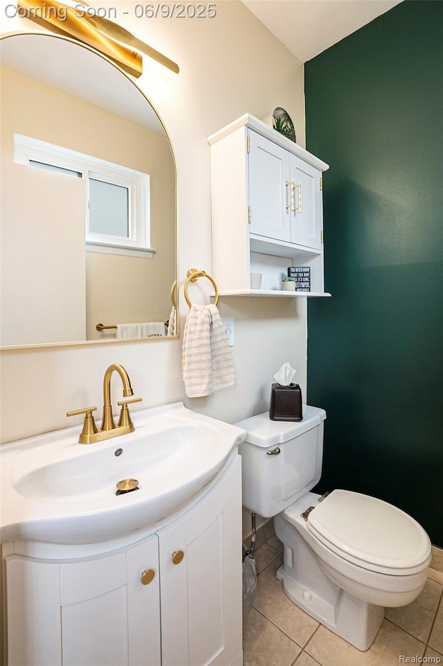 16362 Glenfield Dr, Macomb, MI 48044 - bathroom featuring toilet, vanity, and tile patterned flooring
