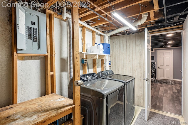16362 Glenfield Dr, Macomb, MI 48044 - washroom with electric panel, washer and clothes dryer, and wood finished floors