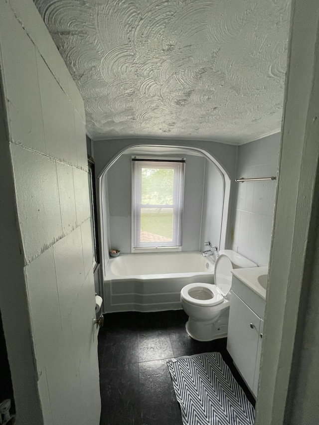 35511 Beverly Rd, Romulus, MI 48174 - full bath with toilet, a bath, a textured ceiling, and vanity