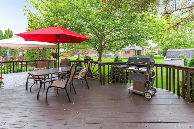 45785 Bryn Mawr Rd, Canton, MI 48187 - wooden deck featuring outdoor dining area, a grill, a yard, and a gazebo