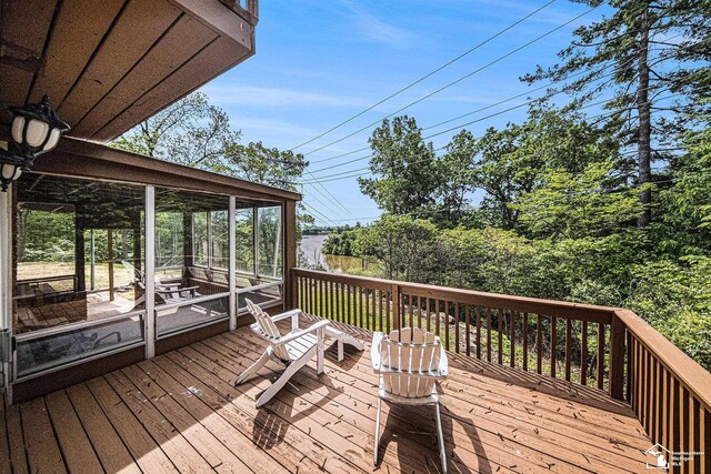 2930 Spielman Rd, Adrian, MI 49221 - deck featuring a sunroom