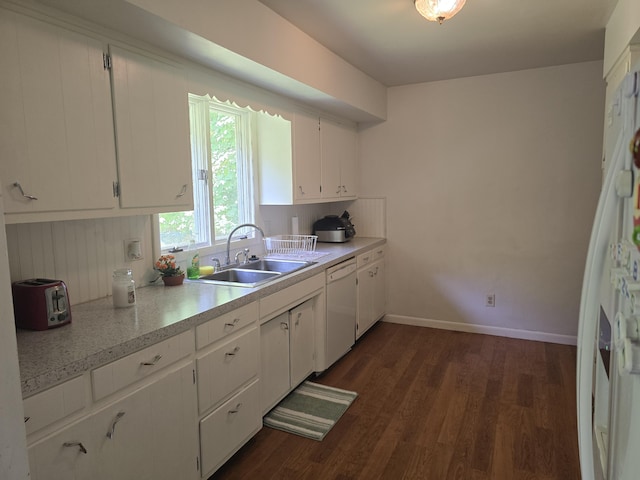 510 E Lewis St, Whitehall, MI 49461 - kitchen with white appliances, a sink, white cabinets, dark wood-style floors, and light countertops