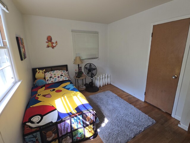 510 E Lewis St, Whitehall, MI 49461 - bedroom with wood finished floors and baseboards