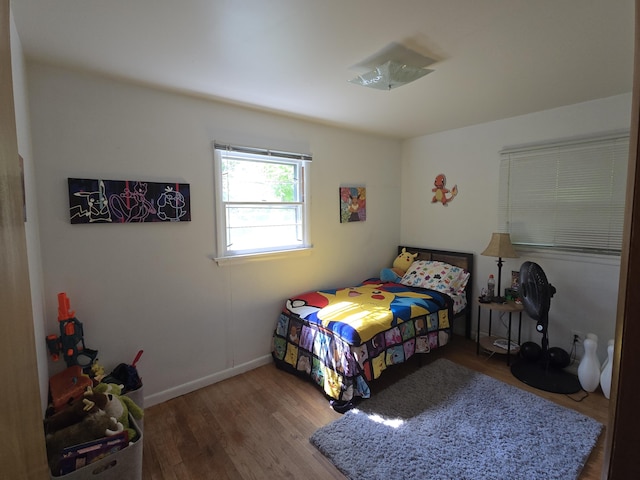 510 E Lewis St, Whitehall, MI 49461 - bedroom with wood finished floors and baseboards