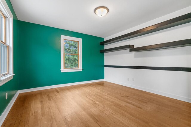 528 Glendale Blvd, Parchment, MI 49004 - empty room with wood finished floors and baseboards