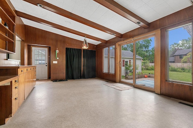 528 Glendale Blvd, Parchment, MI 49004 - unfurnished living room featuring wooden walls and light flooring