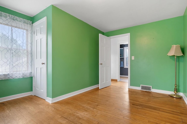 528 Glendale Blvd, Parchment, MI 49004 - unfurnished bedroom featuring light wood-style flooring and baseboards