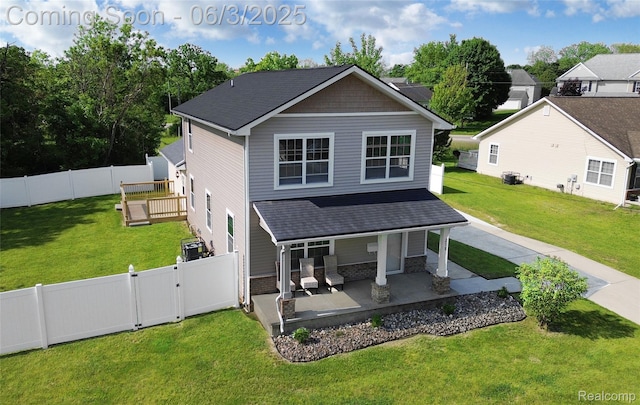 218 E Wood St, Flint, MI 48503 - back of property featuring a gate, covered porch, and roof with shingles
