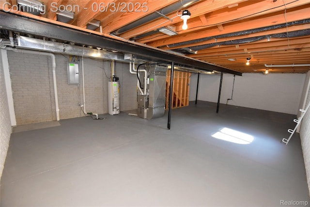 218 E Wood St, Flint, MI 48503 - unfinished basement with heating unit and gas water heater