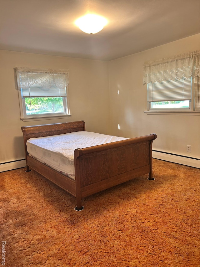 205 Sterling Dr, Lapeer, MI 48446 - carpeted bedroom featuring baseboard heating