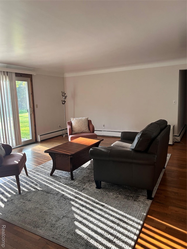 205 Sterling Dr, Lapeer, MI 48446 - living area featuring a baseboard radiator and wood finished floors