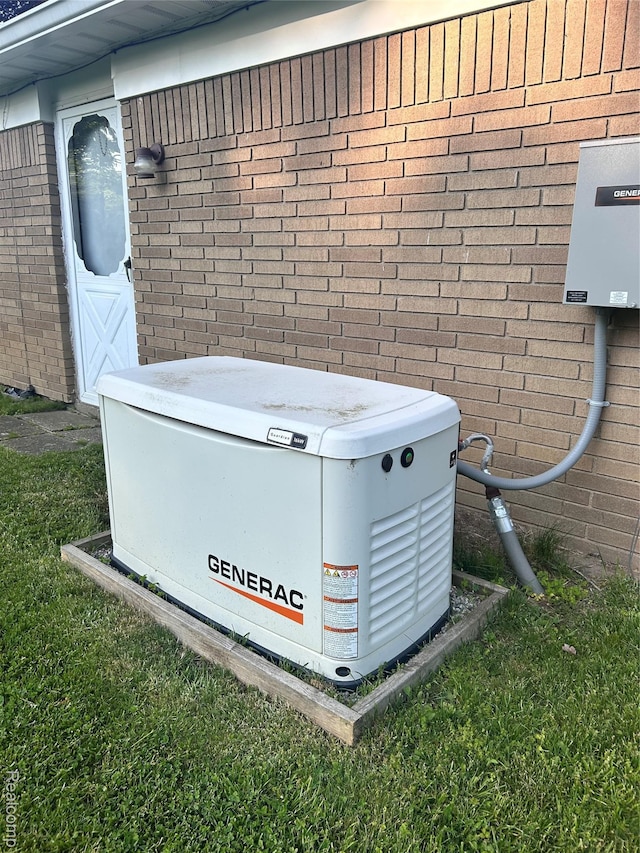 205 Sterling Dr, Lapeer, MI 48446 - exterior view of a power unit and brick siding