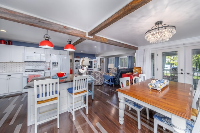 11198 E Royal Rd, Canadian Lakes, MI 49346 - dining room with french doors, a chandelier, beamed ceiling, dark wood-type flooring, and recessed lighting