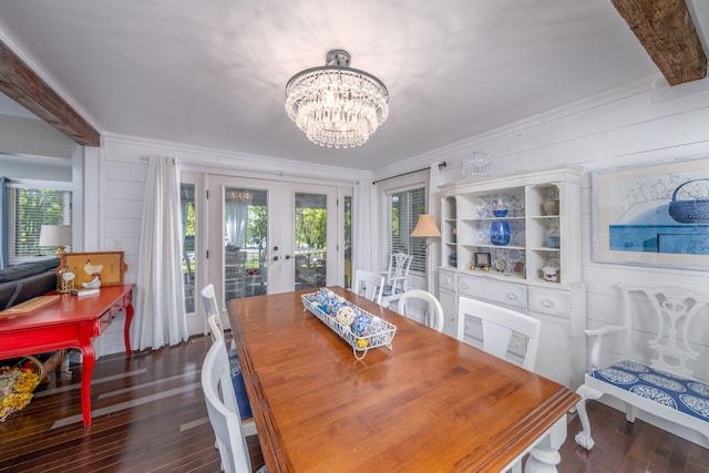 11198 E Royal Rd, Canadian Lakes, MI 49346 - dining area featuring french doors, dark wood finished floors, a chandelier, healthy amount of natural light, and ornamental molding