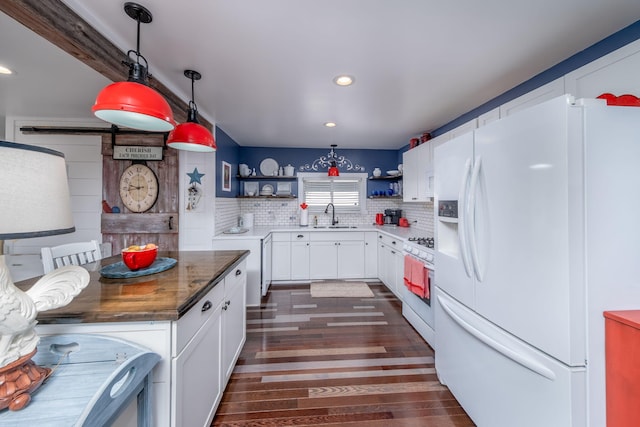 11198 E Royal Rd, Canadian Lakes, MI 49346 - kitchen with white appliances, open shelves, a sink, dark wood-style floors, and white cabinetry