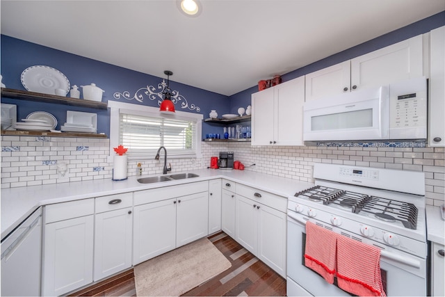 11198 E Royal Rd, Canadian Lakes, MI 49346 - kitchen featuring open shelves, white appliances, a sink, and white cabinetry