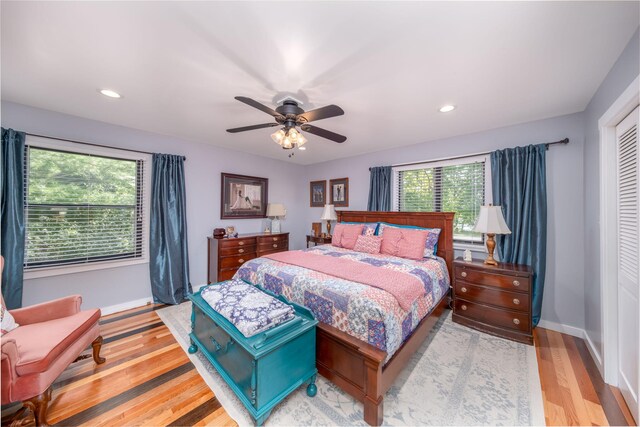 11198 E Royal Rd, Canadian Lakes, MI 49346 - bedroom featuring baseboards, light wood finished floors, ceiling fan, and recessed lighting